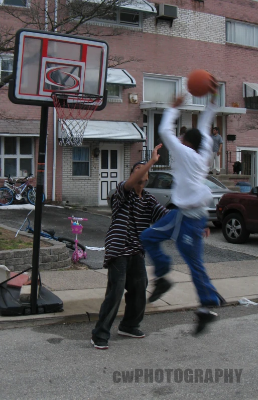 a man standing on top of a basketball court