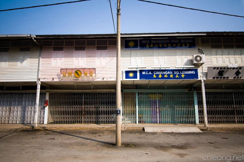 the outside view of a building with multiple gate