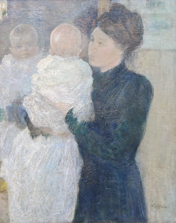 an image of a woman holding a baby