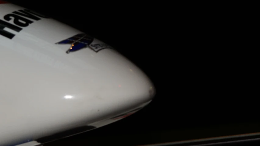 a large airplane that is sitting in the dark