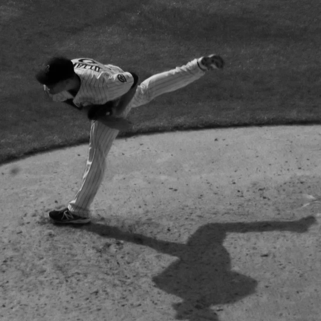 man on baseball field about to throw the ball