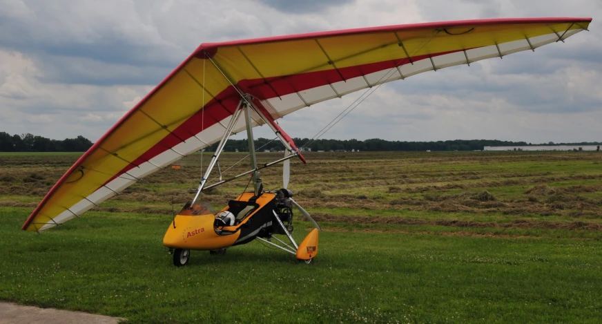 an airplane that is sitting on some grass