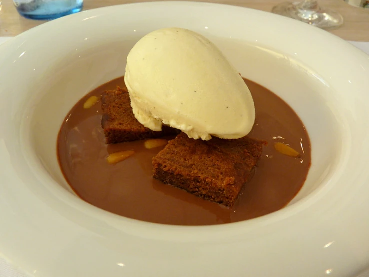 a white plate topped with an ice cream dessert