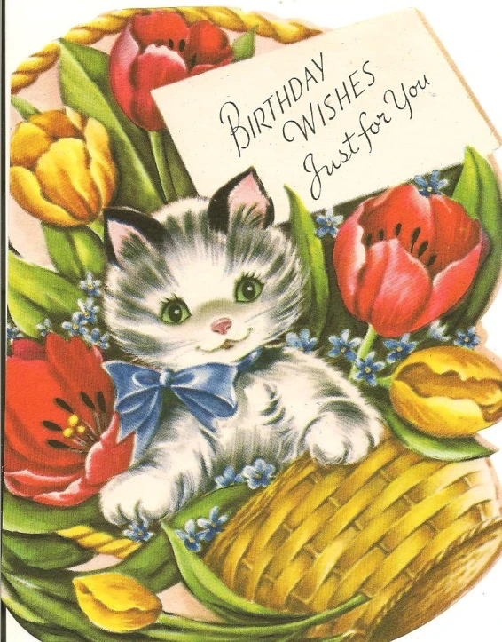 an old fashioned birthday card has a kitten in a basket on it