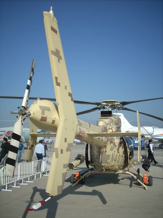 a helicopter that has some kind of military like body