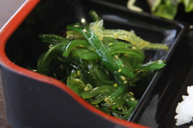 small dishes filled with chopped up green vegetables