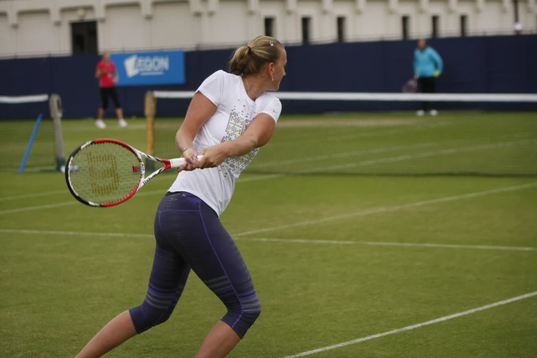 a tennis player prepares to hit a ball