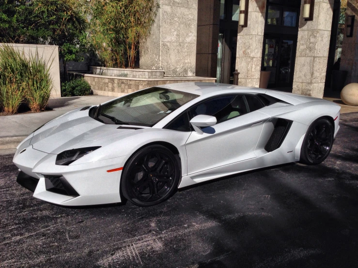 an all white lambino on the street