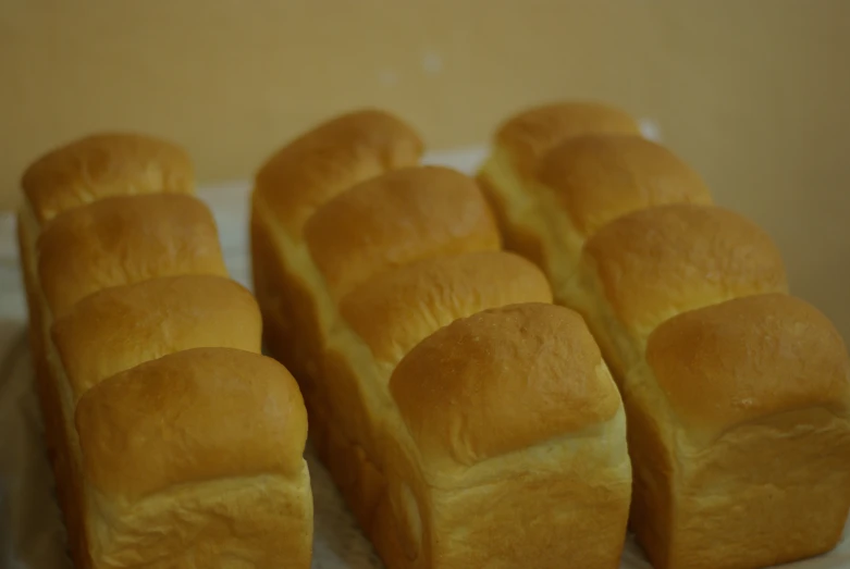 a plate topped with lots of cut bread