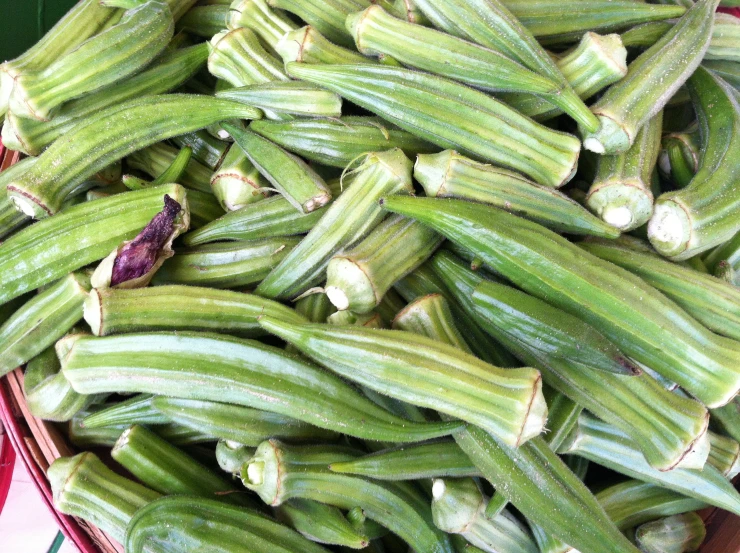 there is a large basket of green beans