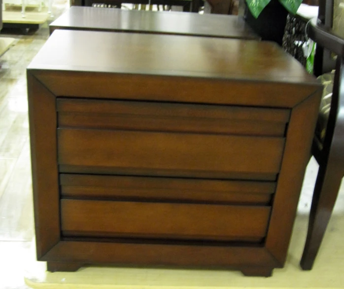 wooden drawers on display inside of a store