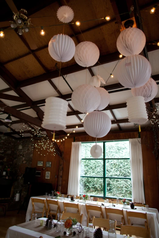 a set table in the middle of an indoor dining room