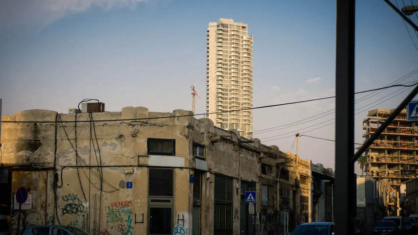 a street view of buildings with graffiti on them