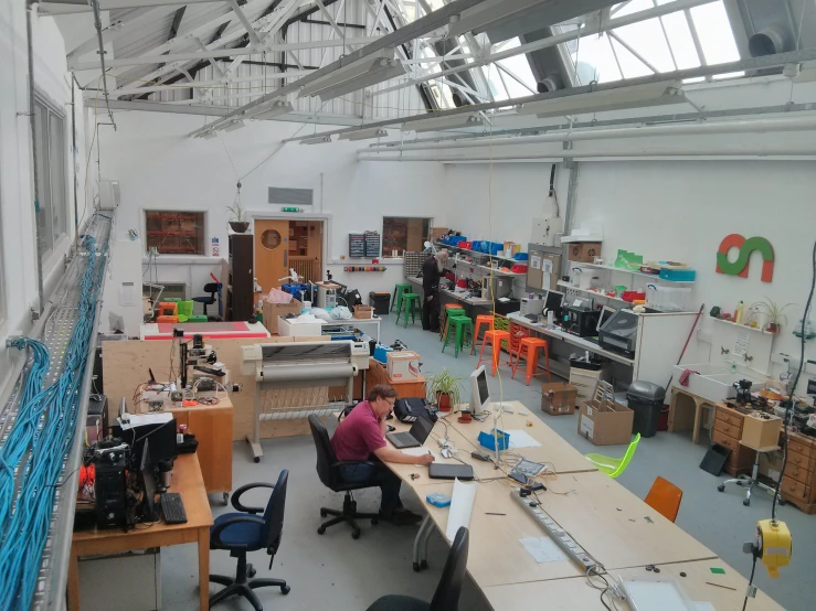 a group of people work in an empty room