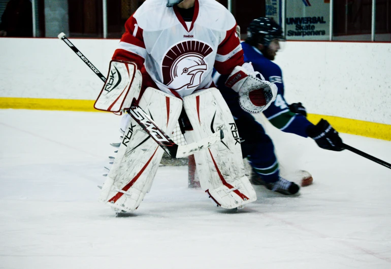 a hockey player looking at the ice