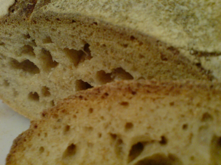 slices of bread on a plate next to other items