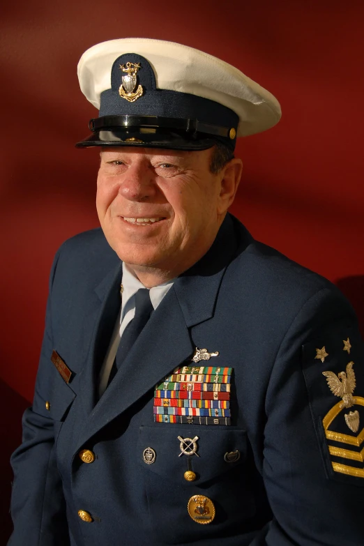 a man in military uniform with medals on his chest
