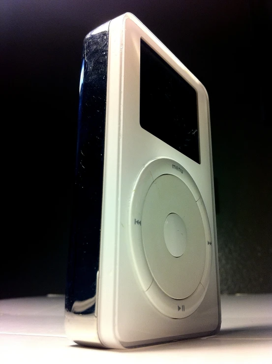 an ipod sitting on top of a counter
