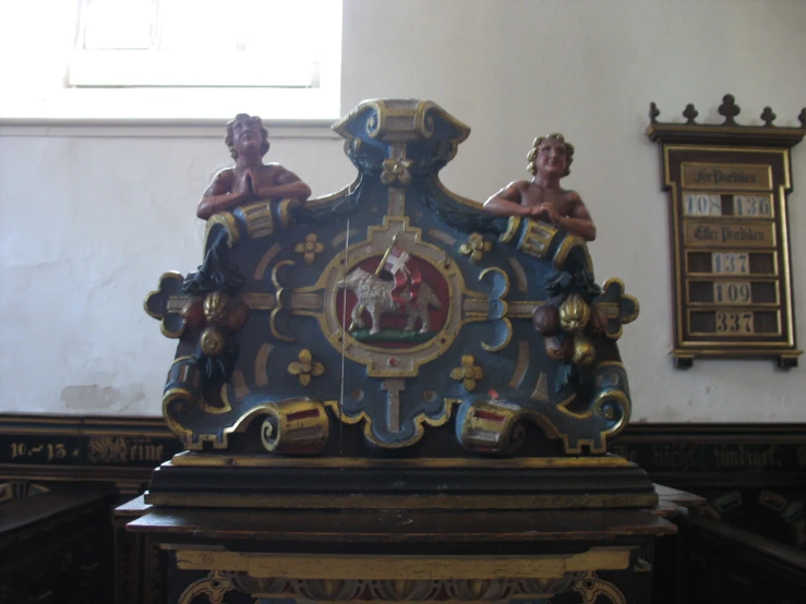 a fancy clock sitting in the corner of a room