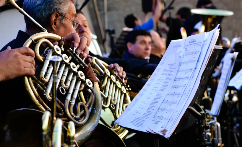 a group of ss musicians holding musical instruments