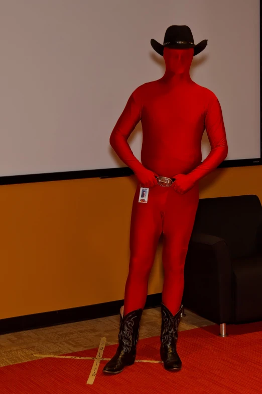 a red man is dressed up in a cowgirl suit