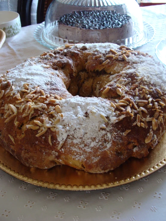 a cake with various toppings on a plate on a table