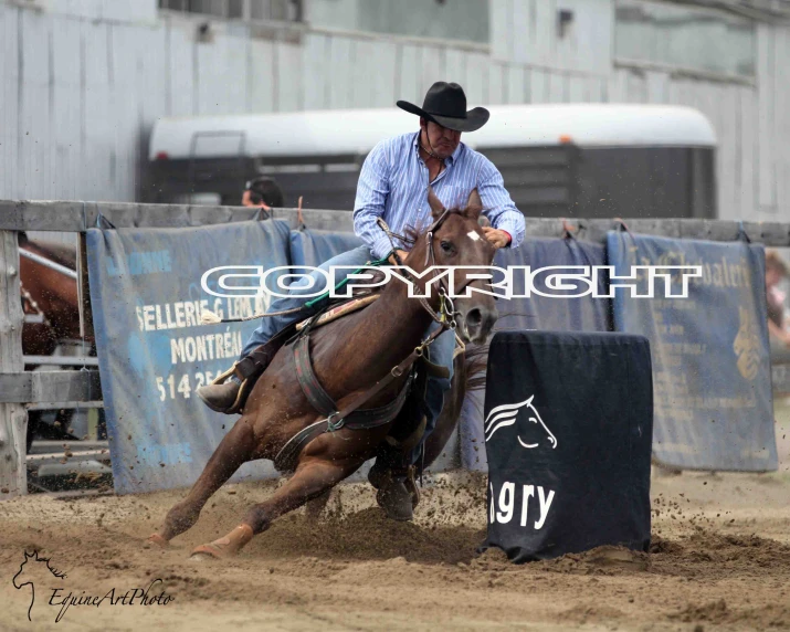 a rodeo rider falling off his horse as he is bucked up