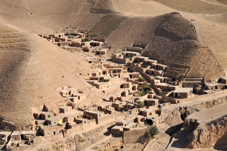 an overview of a village built up in the desert