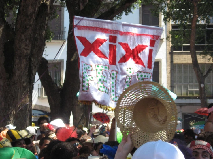 a crowd of people are watching a parade