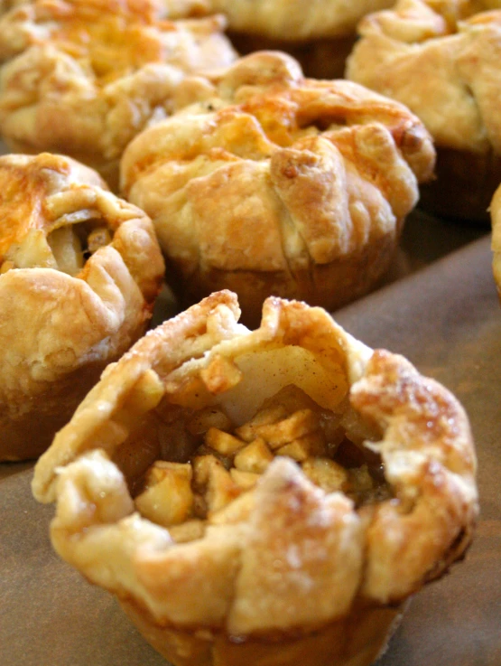 some food on a metal pan that has some kind of pie in it