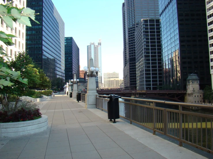 this is a wide street with people walking around