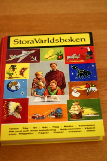 the book storavardisoken is sitting on a wooden table