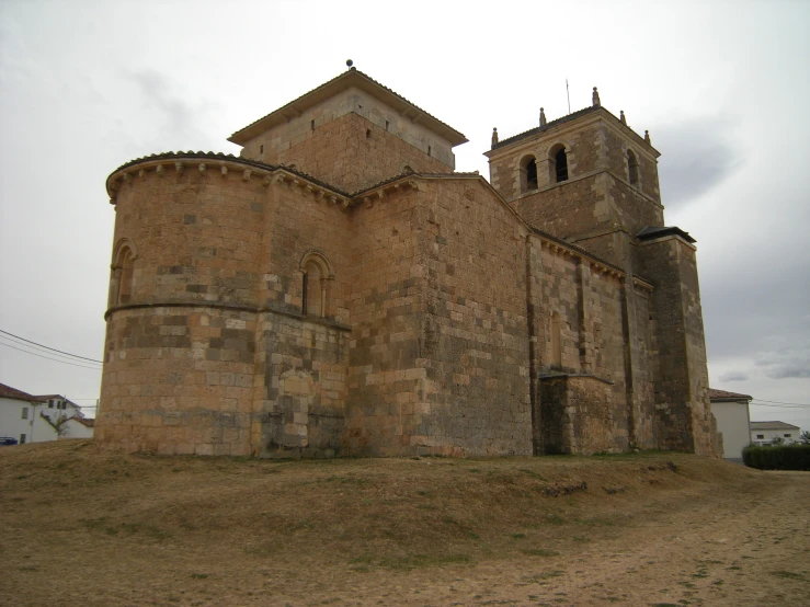 an old castle structure is shown during the day