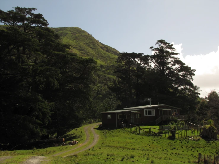 the cabin is on the side of the hill