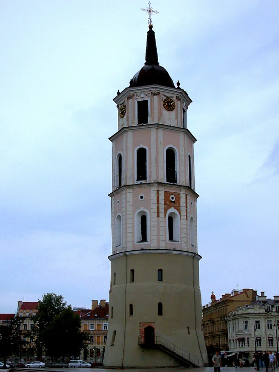 the large bell tower is in a very old town