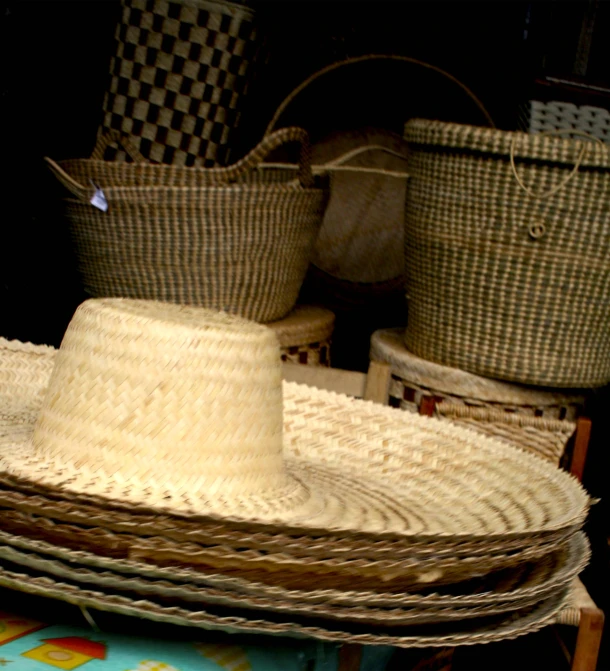 several baskets and hat on top of each other