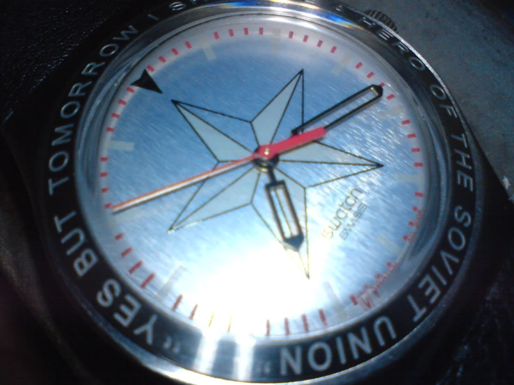 a close up s of a compass watch