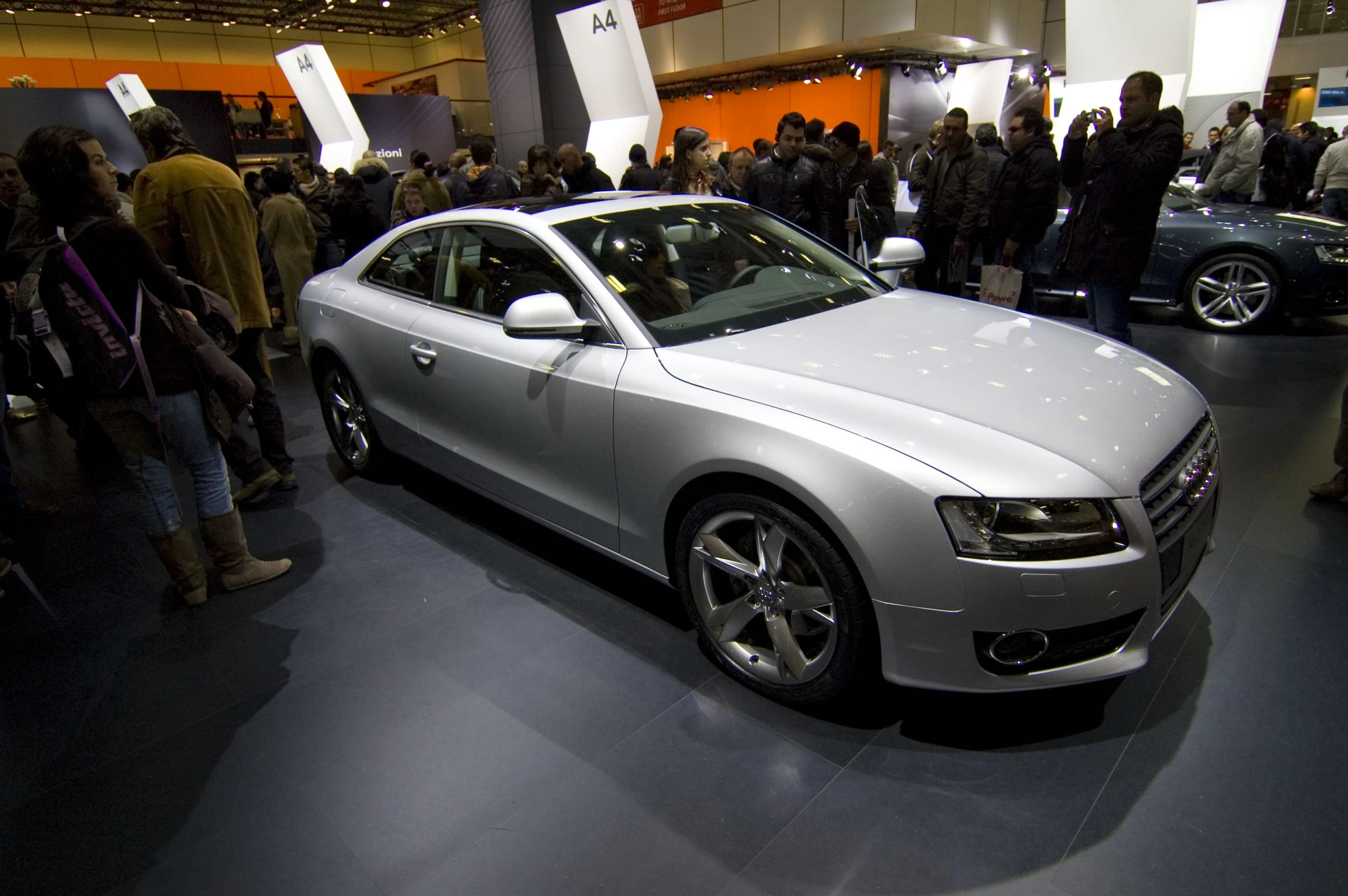 an automobile is on display at a show