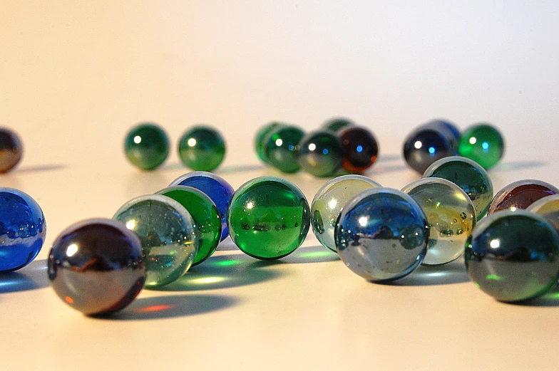 this is a group of marbles that are on a table