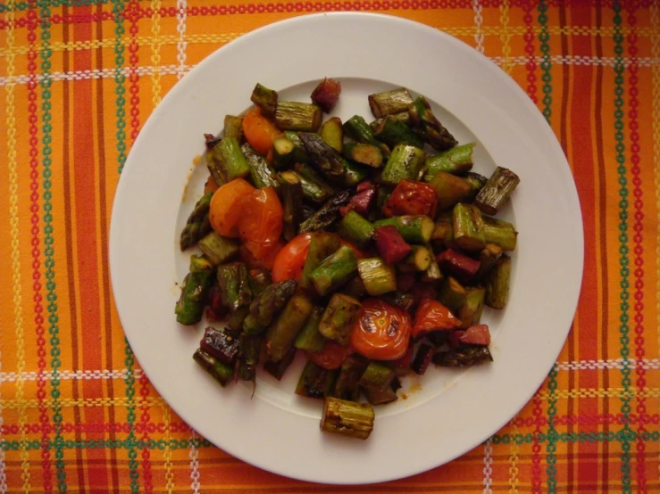a plate filled with a vegetable and carrot salad