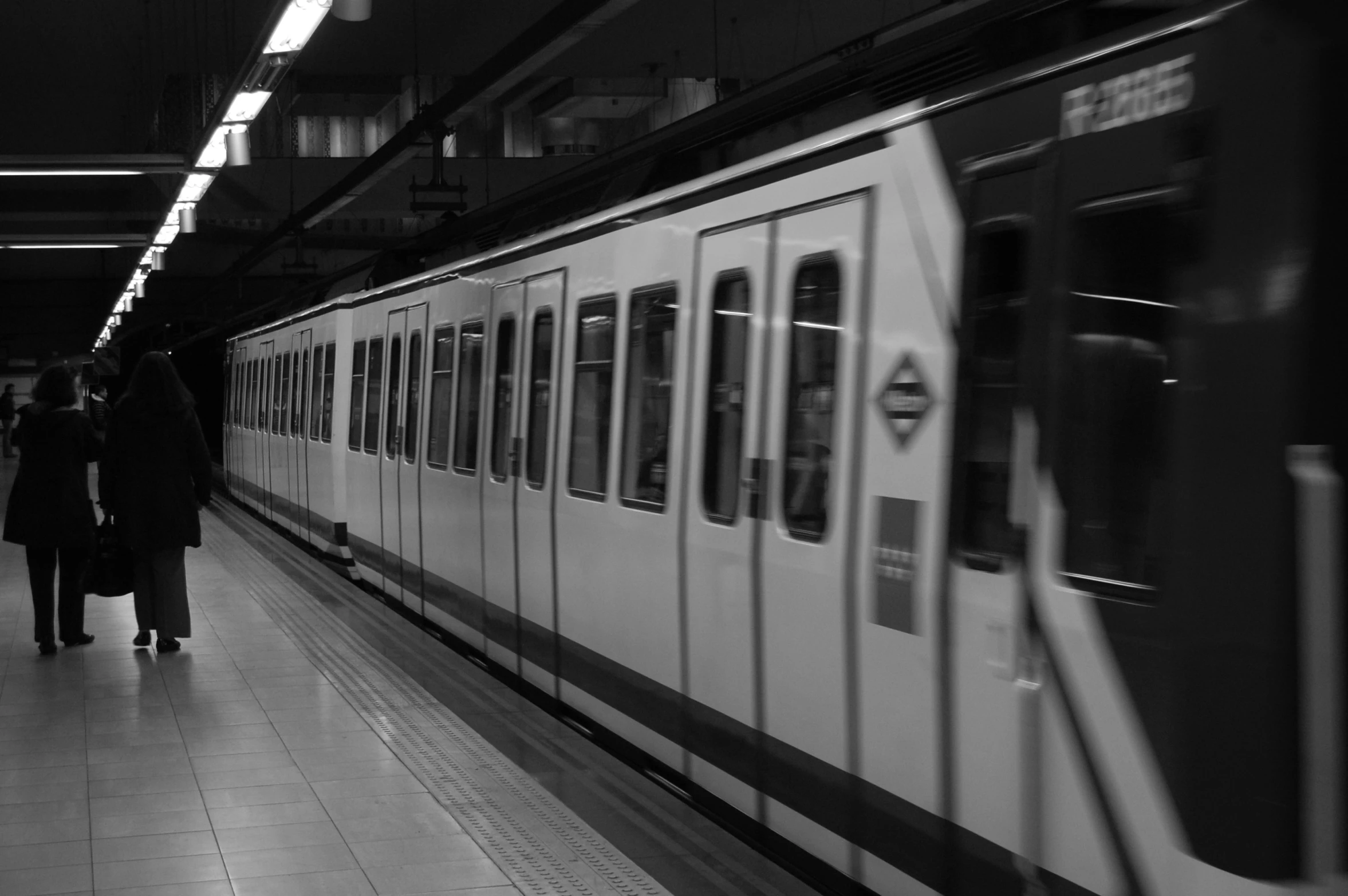 a train on the train track at night