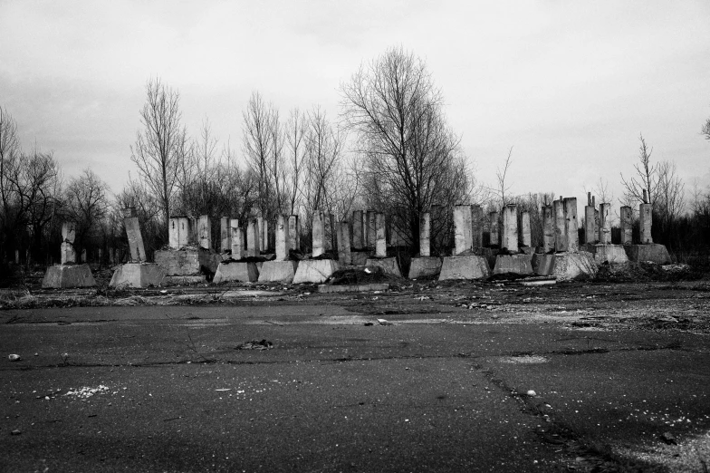 a large group of graves sitting on top of a field