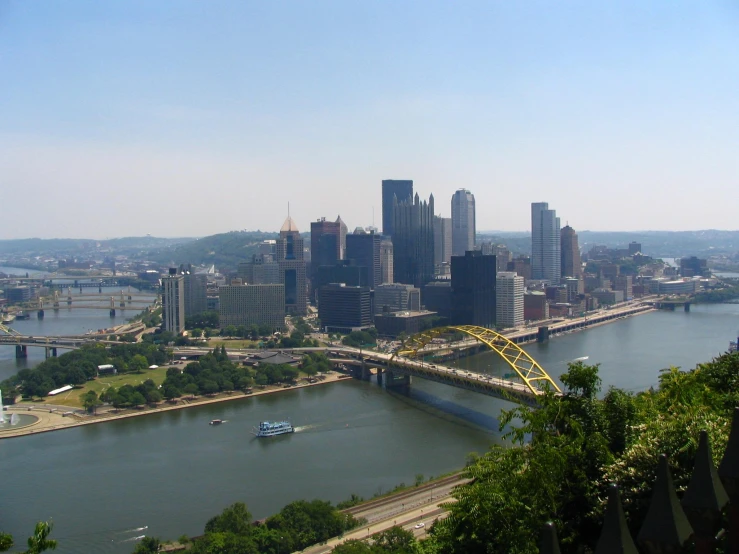 an overview of a city with a bridge spanning it