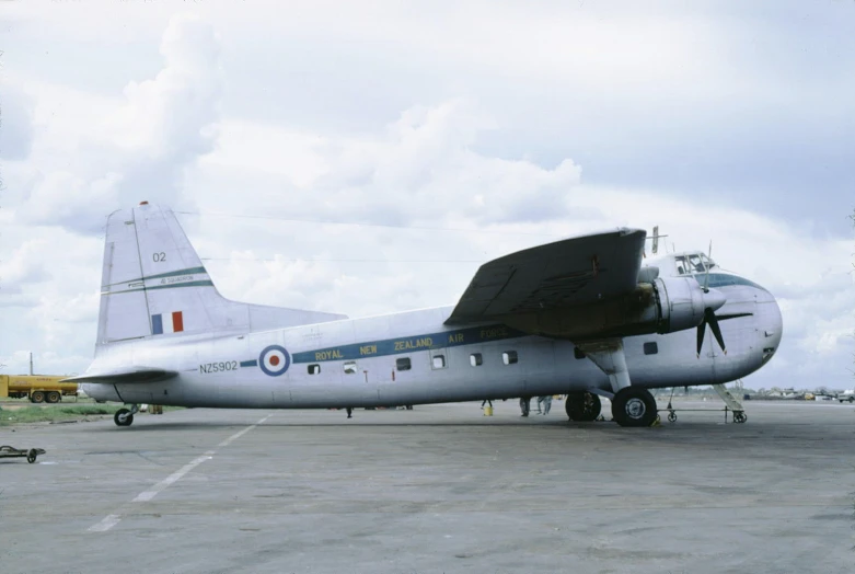 there is an old aircraft that has been parked on the runway