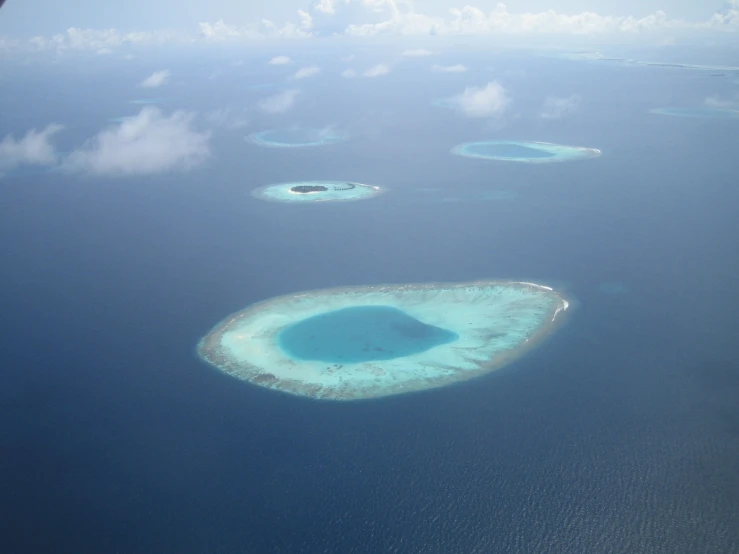 an island is seen from the air above