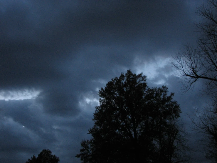 the sky is dark and dreary as dusk falls