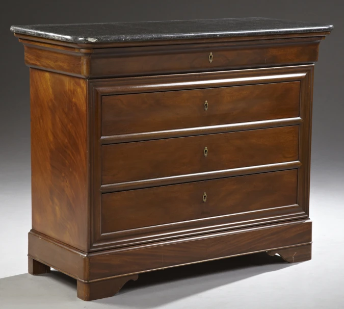 a very nice wood and marble topped chest