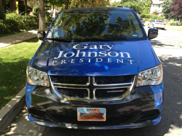 the car is painted with the company's slogan