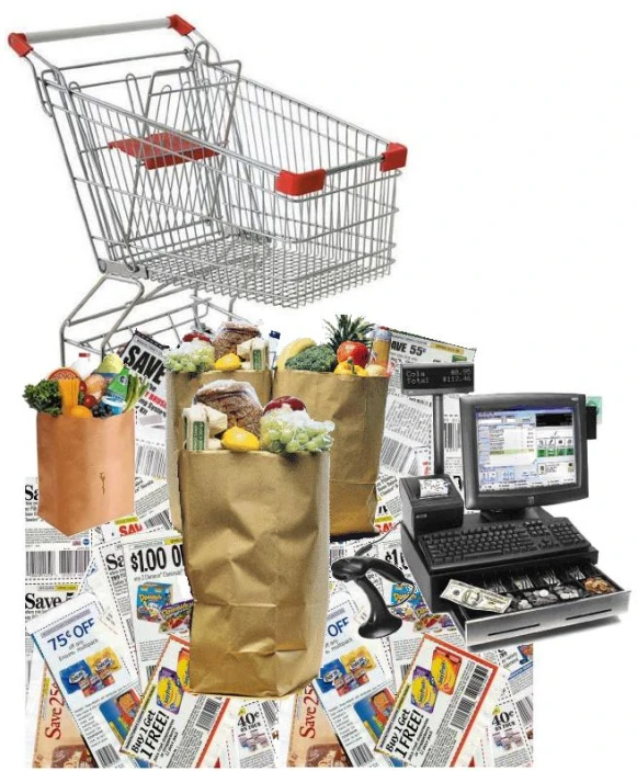 an open shopping bag is near shopping bags on a pile of newspapers with an electronic computer nearby