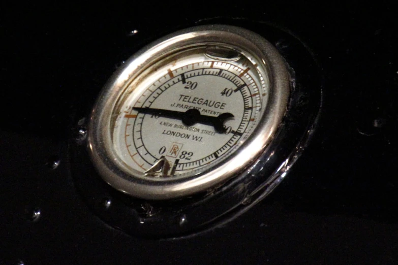 a closeup of a gauge showing pressure or volume